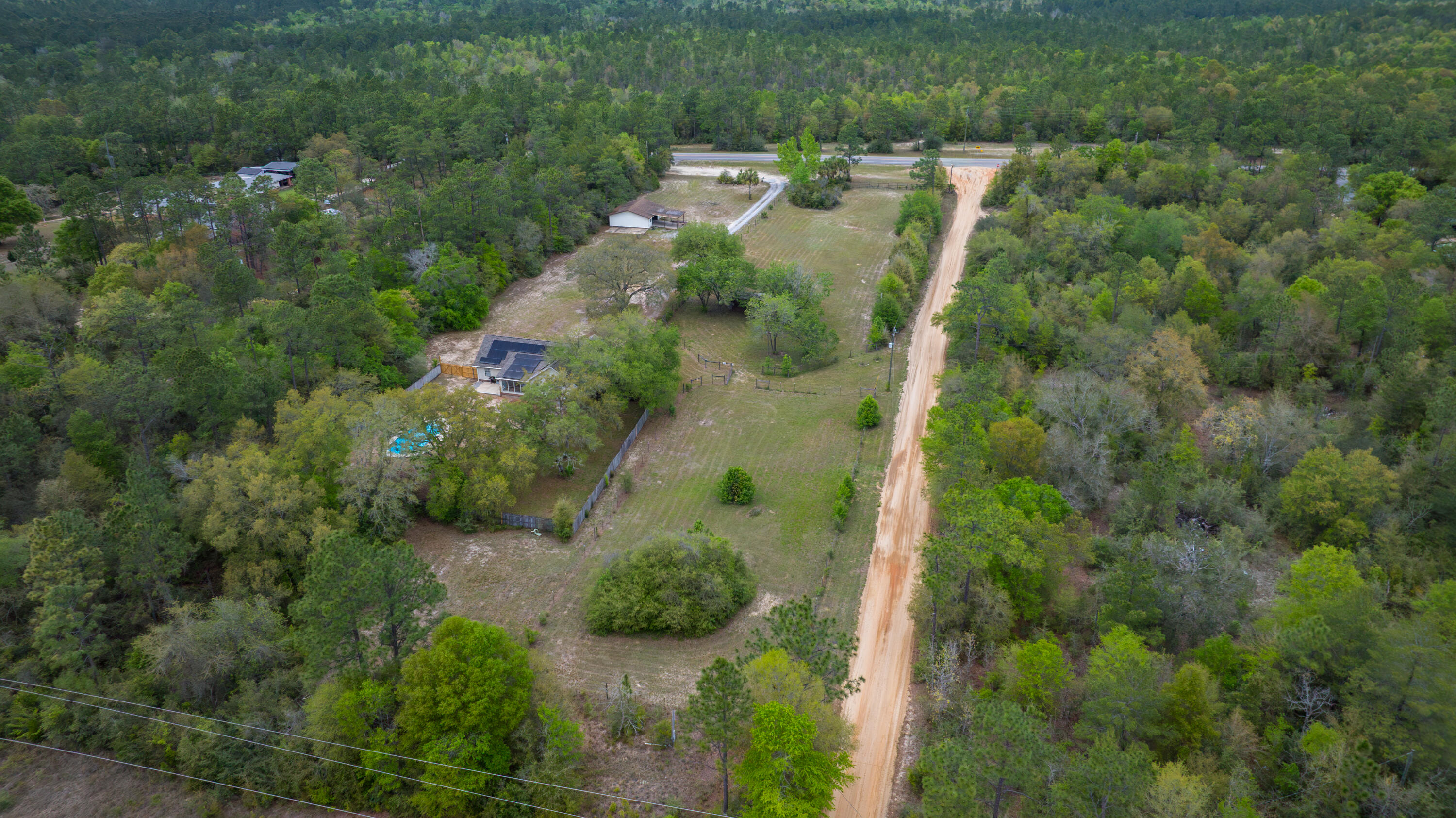 3494 Highway 90 Crestview, FL 32539 - Photo 68 of 71 an aerial view of residential house with outdoor space and trees all around