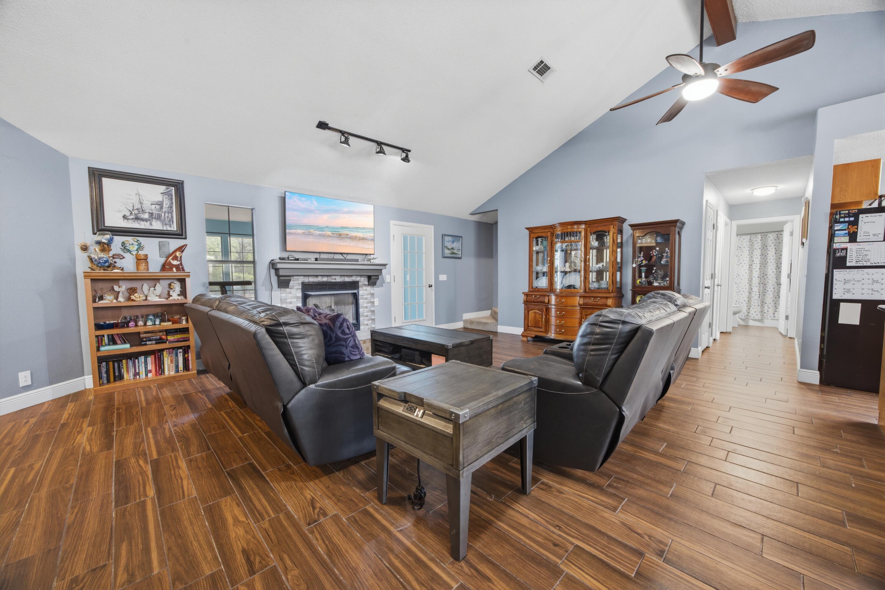 3494 Highway 90 Crestview, FL 32539 - Photo 9 of 71 a living room with furniture and a fireplace