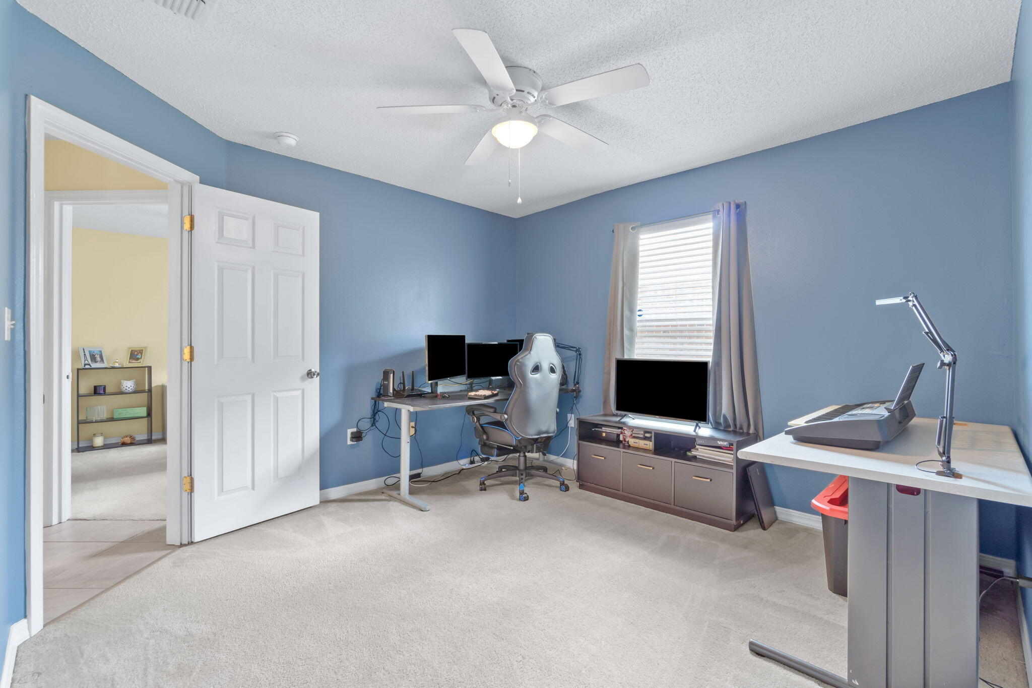 246 Limestone Circle Crestview, FL 32539 - Photo 15 of 27 a view of workspace with livingroom view