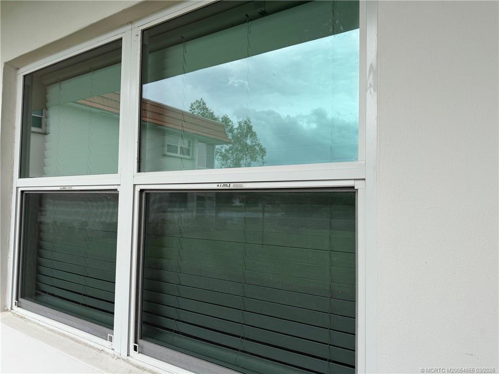 1225 Northwest 21st Street, Unit 7705 Stuart, FL 34994 - Photo 2 of 28 a view of outdoor from window