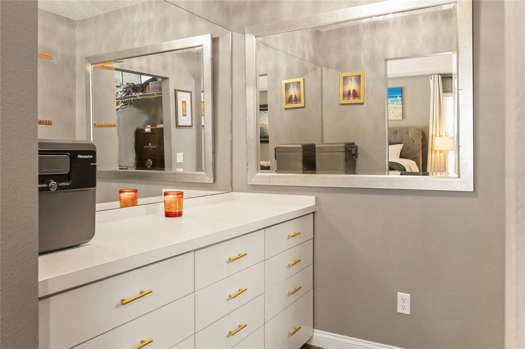 133 Ross Lake Lane Sanford, FL 32771 - Photo 16 of 32 a bathroom with a sink and a mirror