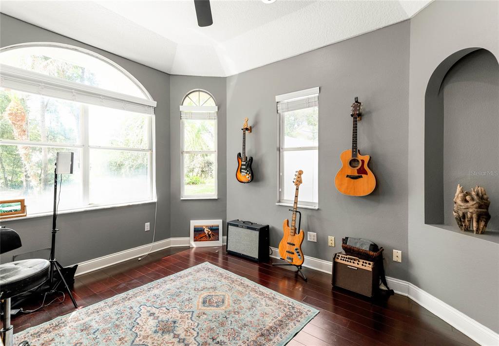 133 Ross Lake Lane Sanford, FL 32771 - Photo 21 of 32 a living room with furniture and a window
