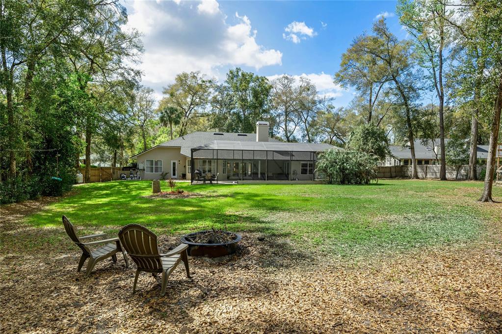 133 Ross Lake Lane Sanford, FL 32771 - Photo 28 of 32 a front view of a house with garden and a sitting area