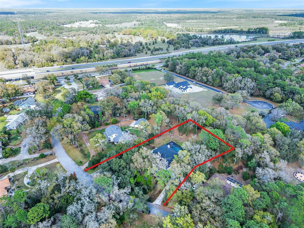 133 Ross Lake Lane Sanford, FL 32771 - Photo 30 of 32 an aerial view of houses with yard