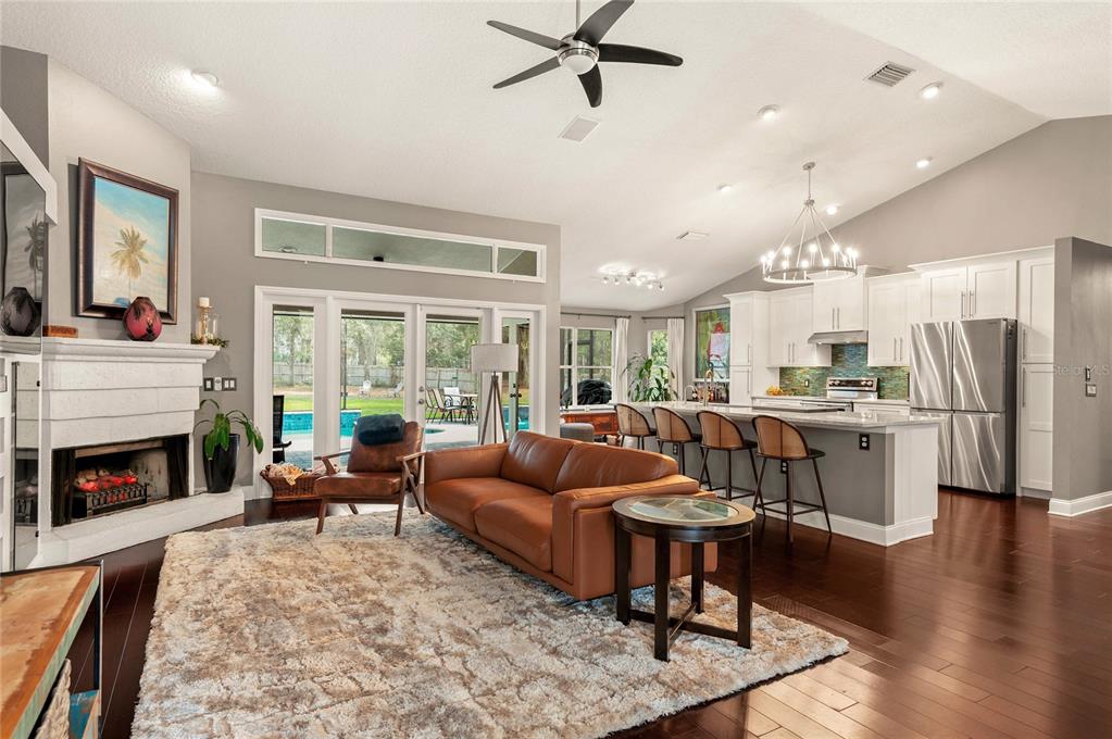 133 Ross Lake Lane Sanford, FL 32771 - Photo 3 of 32 a living room with fireplace furniture and a fireplace