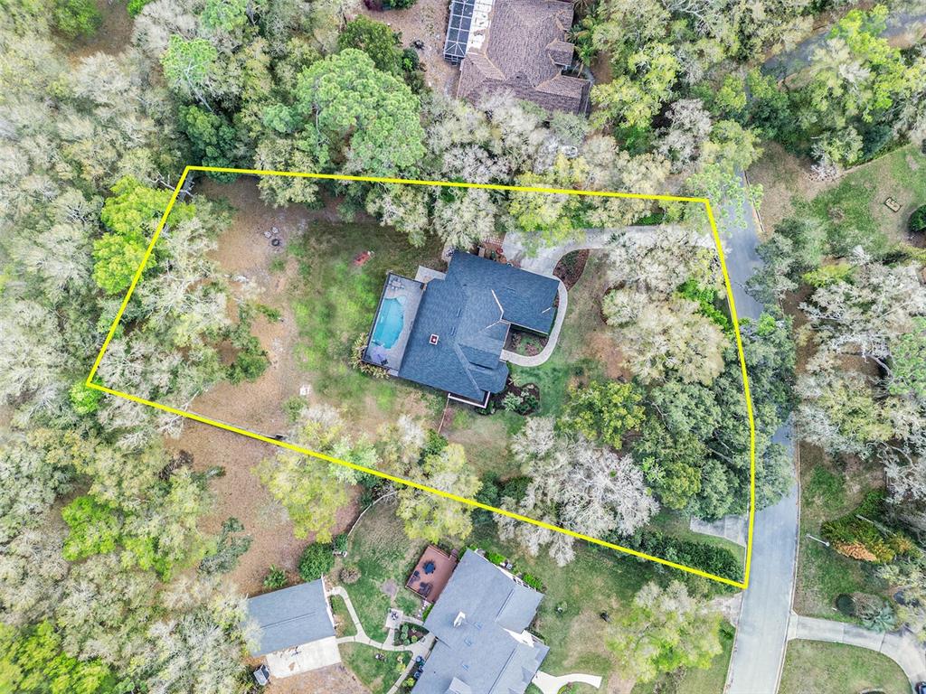133 Ross Lake Lane Sanford, FL 32771 - Photo 31 of 32 an aerial view of a house with a yard