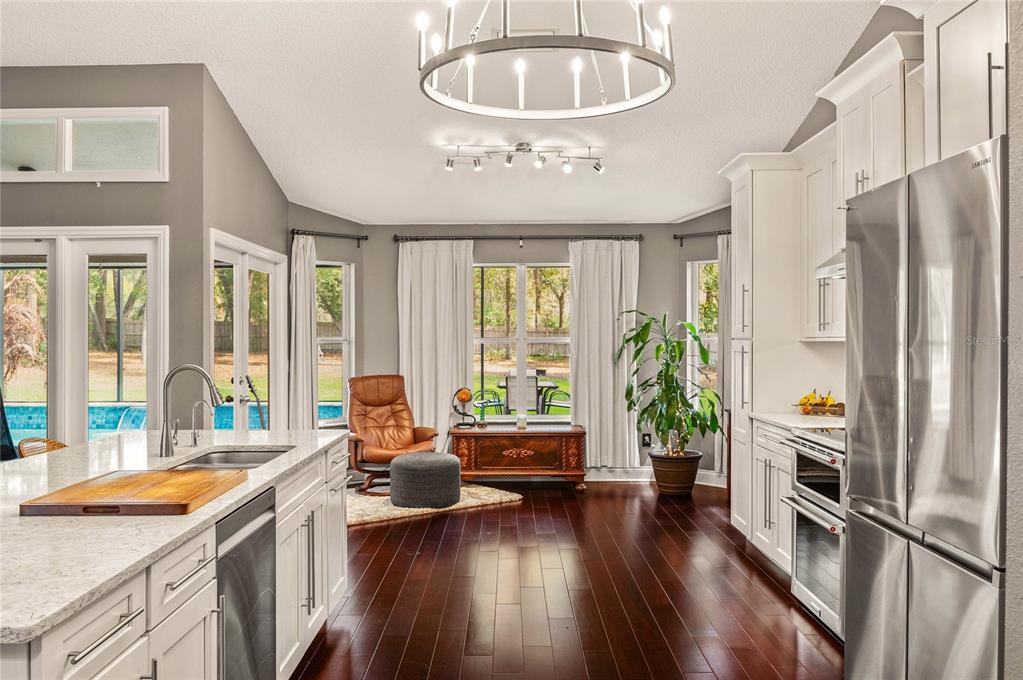 133 Ross Lake Lane Sanford, FL 32771 - Photo 6 of 32 a living room with furniture and a large window