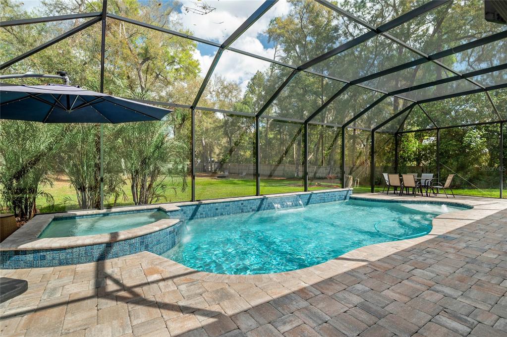 133 Ross Lake Lane Sanford, FL 32771 - Photo 10 of 32 a view of backyard with swimming pool and seating