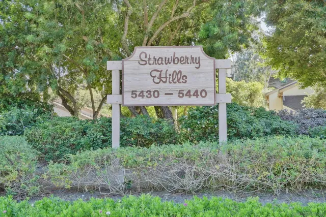 a sign on the side of the road