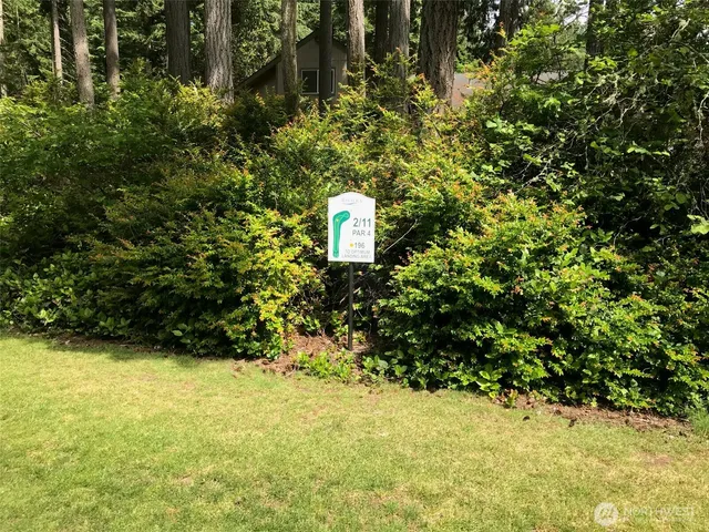 a sign on the side of the road