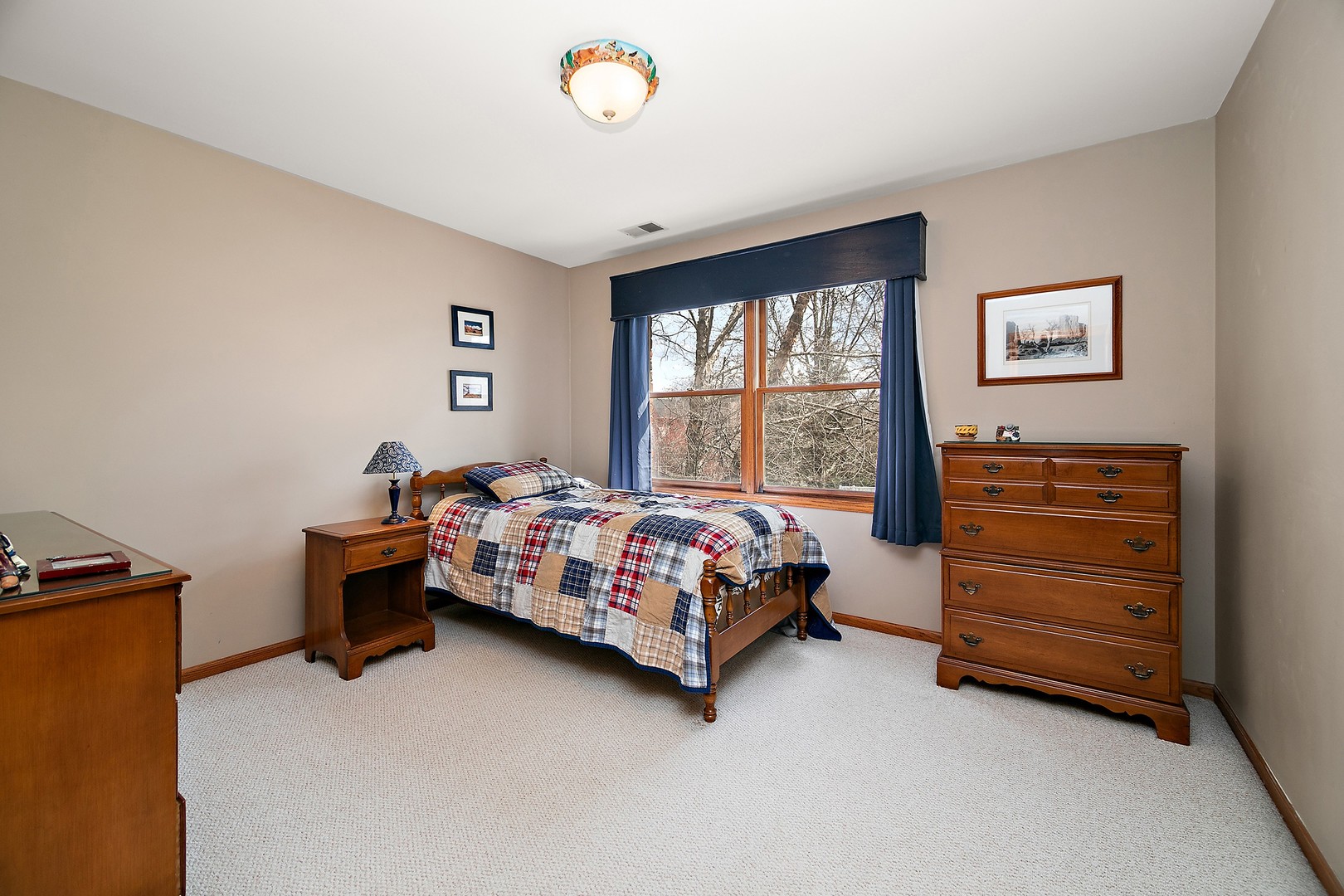 16200 Kingsport Road Orland Park, IL 60467 - Photo 17 of 32 a bedroom with a bed and a window