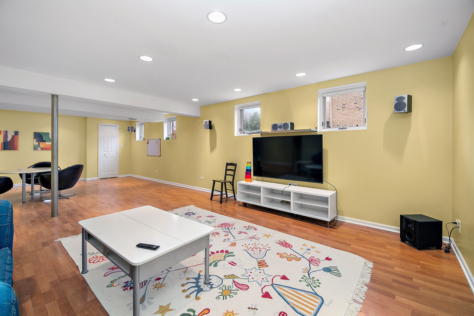 16200 Kingsport Road Orland Park, IL 60467 - Photo 21 of 32 a living room with furniture and a flat screen tv