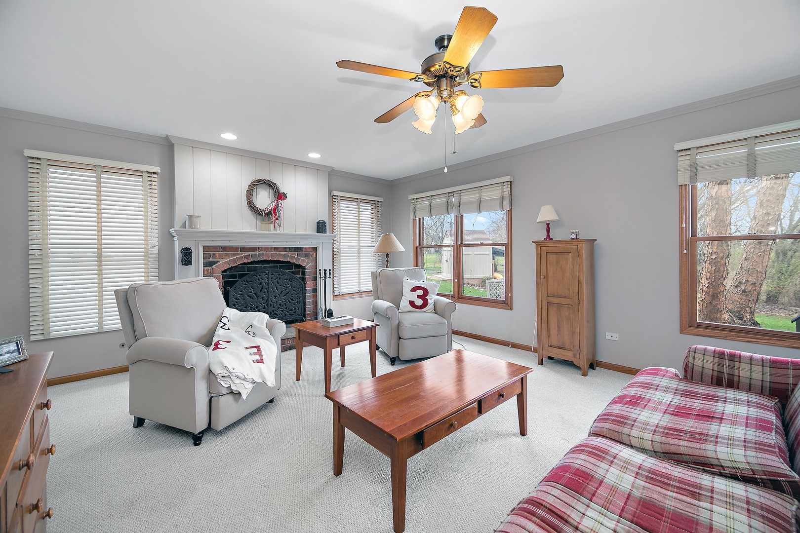 16200 Kingsport Road Orland Park, IL 60467 - Photo 3 of 32 a living room with furniture a fireplace and a window