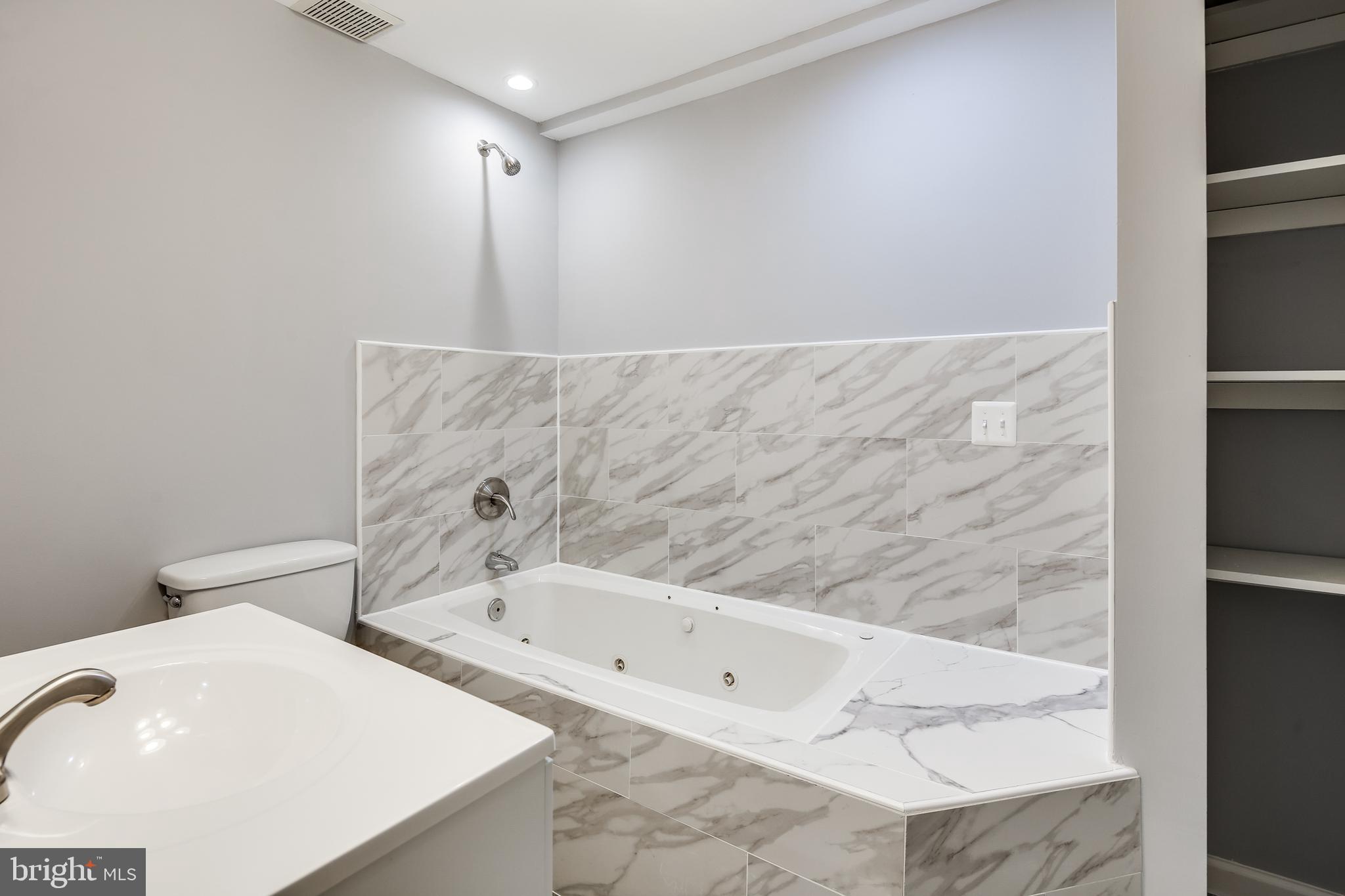 3100 Sounding Drive Edgewood, MD 21040 - Photo 22 of 29 Lower level bath w/ new tile, lights, & cabinet