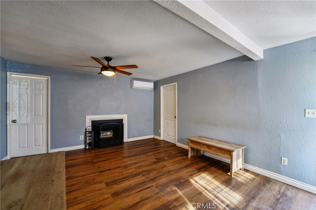 313 North 3rd Street Banning, CA 92220 - Photo 19 of 30 a view of livingroom with furniture and a fireplace