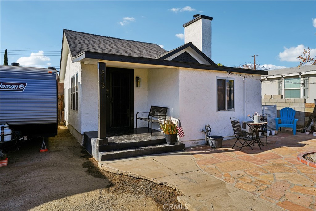 313 North 3rd Street Banning, CA 92220 - Photo 24 of 30 a front view of a house with outdoor seating