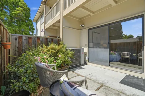 a house view with a garden space