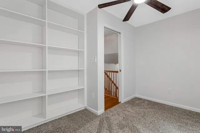 a view of a hallway with entryway