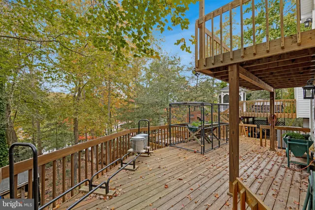 a view of a wooden deck with city view