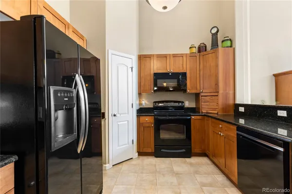 a kitchen with a stove and a microwave