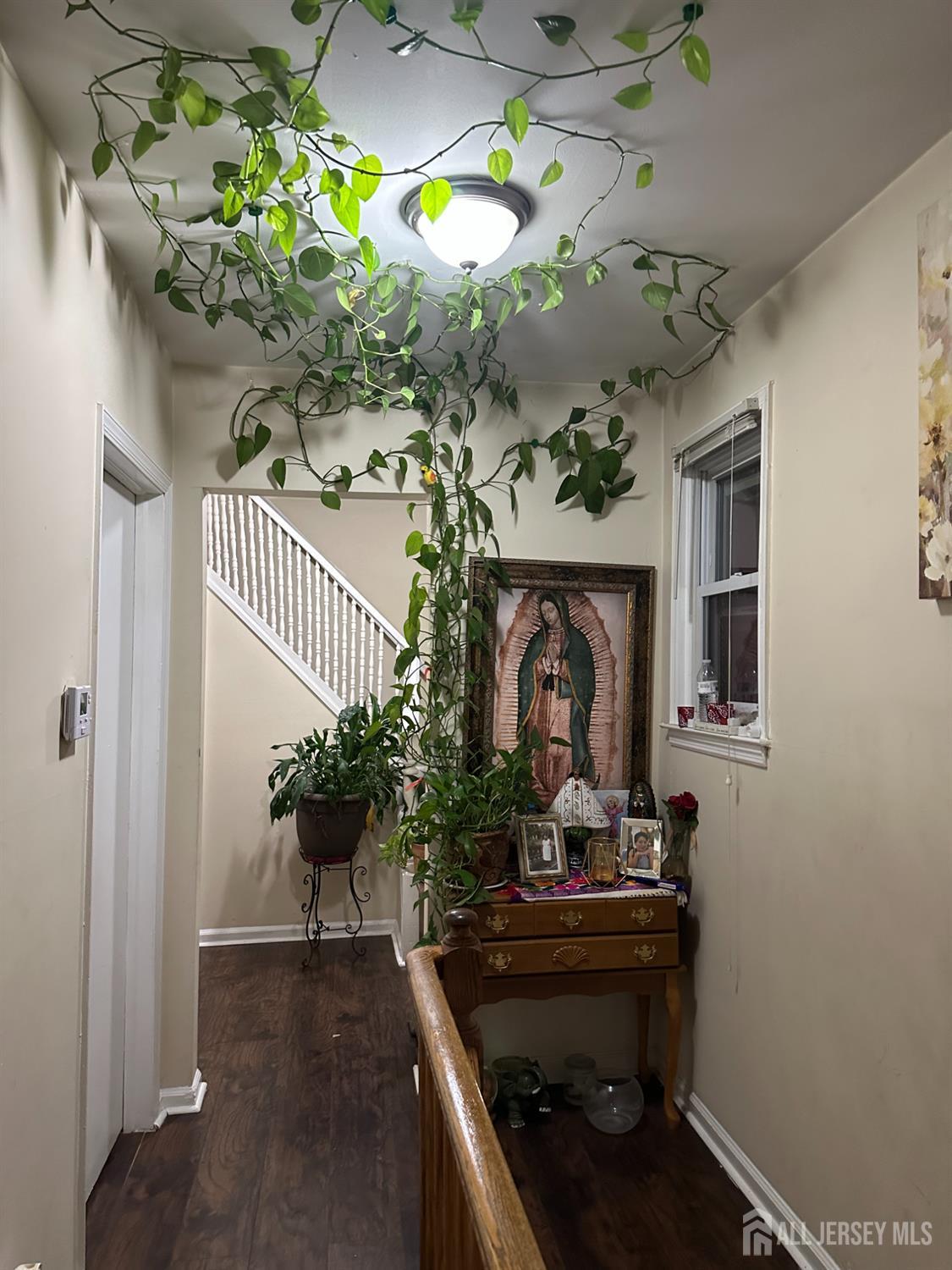 2 Ball Street New Brunswick, NJ 08901 - Photo 12 of 18 a living room with furniture and a fireplace