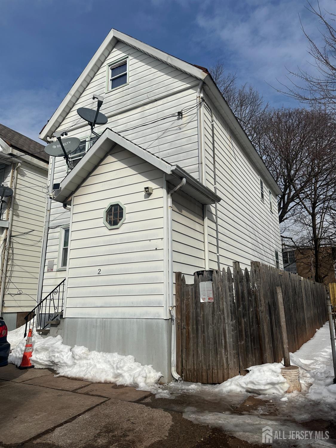 2 Ball Street New Brunswick, NJ 08901 - Photo 3 of 18 a view of a house with a yard