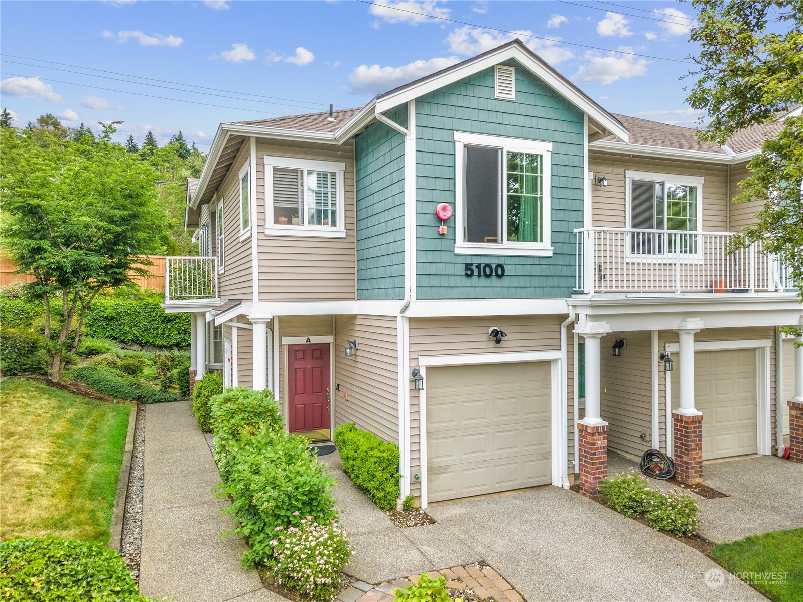 5100 Talbot Place South, Unit A Renton, WA 98055 - Photo 1 of 15 front view of a house with a yard