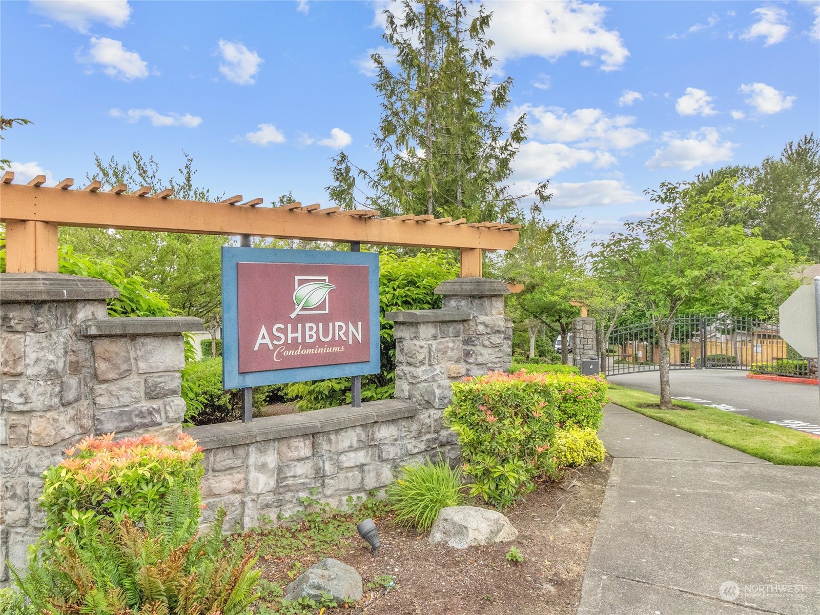 5100 Talbot Place South, Unit A Renton, WA 98055 - Photo 8 of 15 a sign on the side of a building