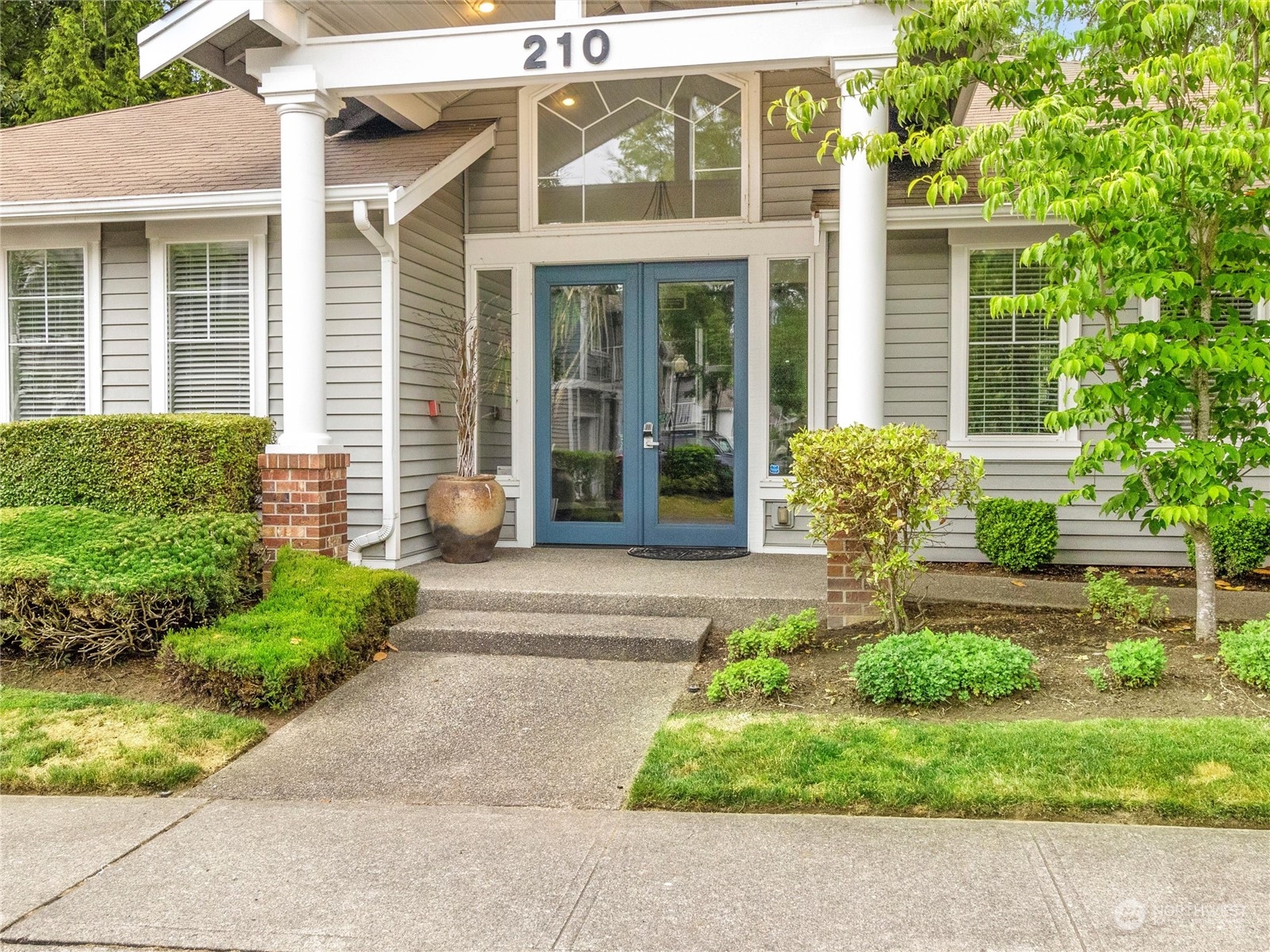 5100 Talbot Place South, Unit A Renton, WA 98055 - Photo 9 of 15 front view of a house with a yard