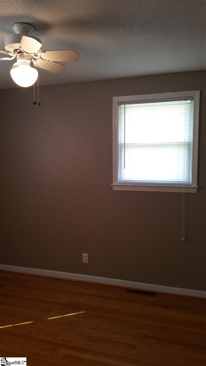 926 Winterhawk Circle Inman, SC 29349 - Photo 16 of 27 View from the door to Bedroom 2, with Ceiling Fan