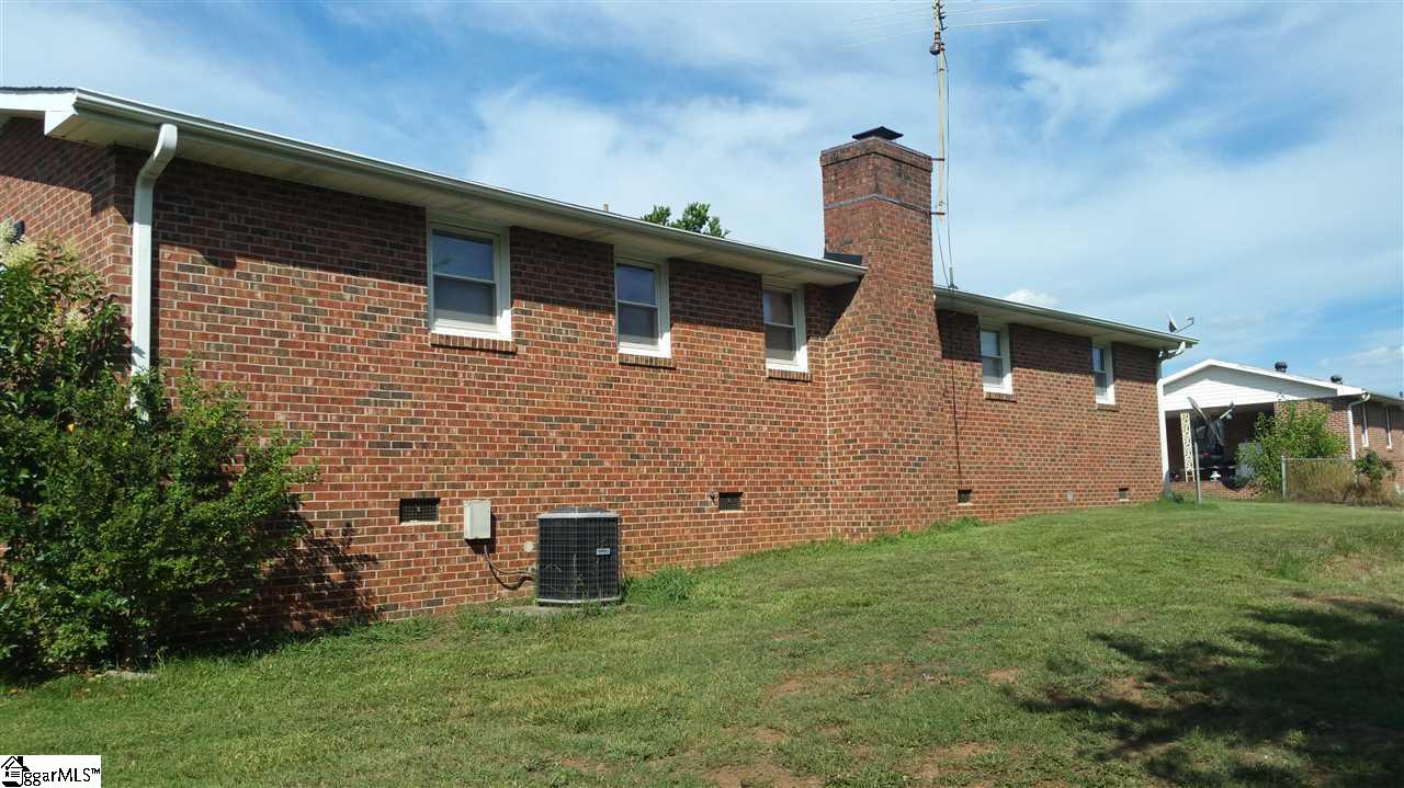 926 Winterhawk Circle Inman, SC 29349 - Photo 23 of 27 View from the backyard. You can see the 2 year old Heat Pump.
