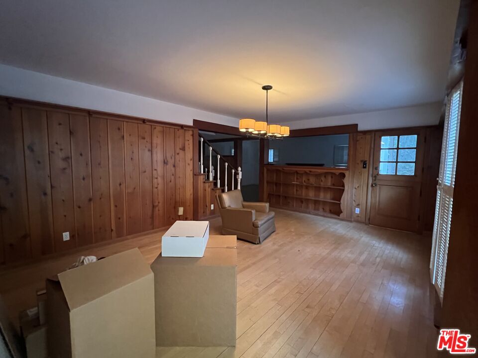 14807 Round Valley Drive Sherman Oaks, CA 91403 - Photo 15 of 25 an empty room with fireplace and windows
