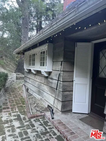 a front view of a house with a garage