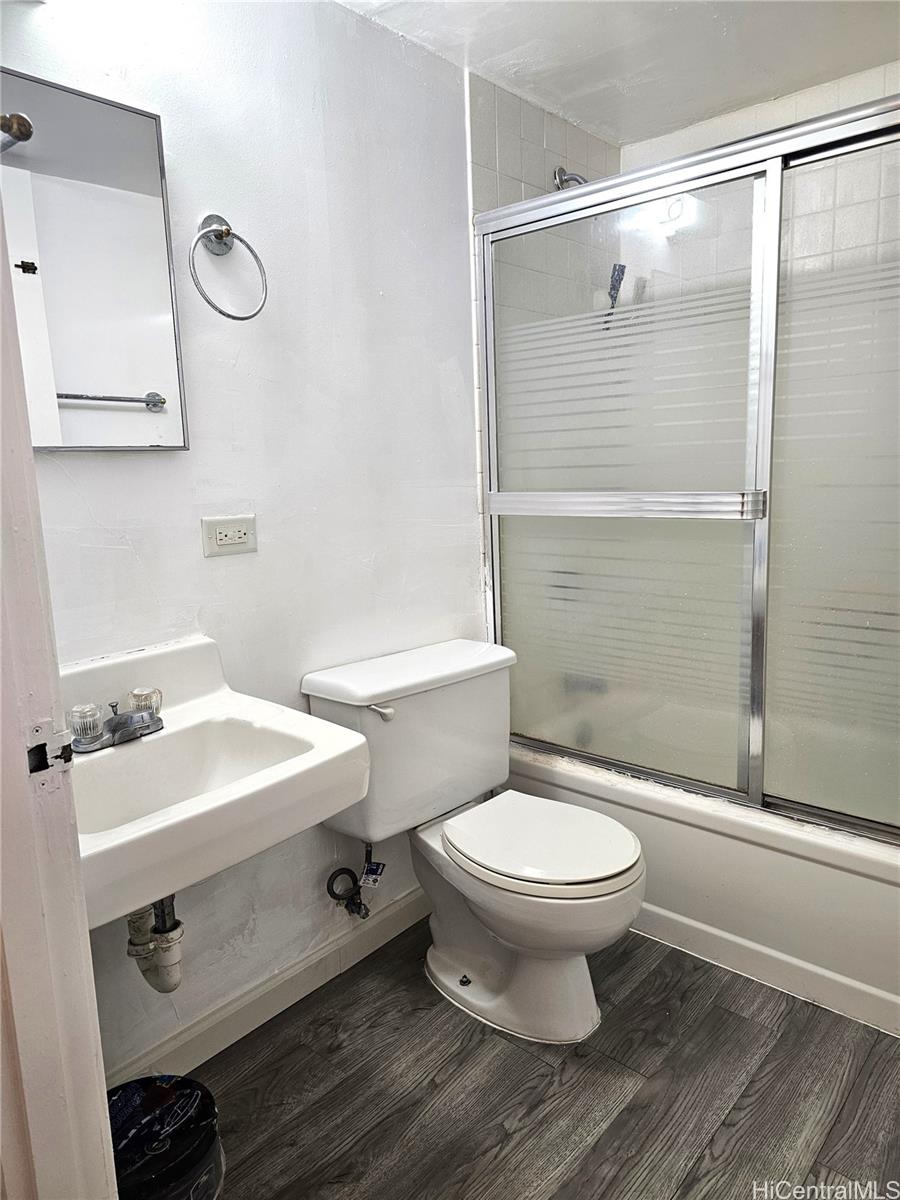 1260 Richard Lane, Unit B404 Honolulu, HI 96819 - Photo 12 of 13 a bathroom with a sink toilet and shower