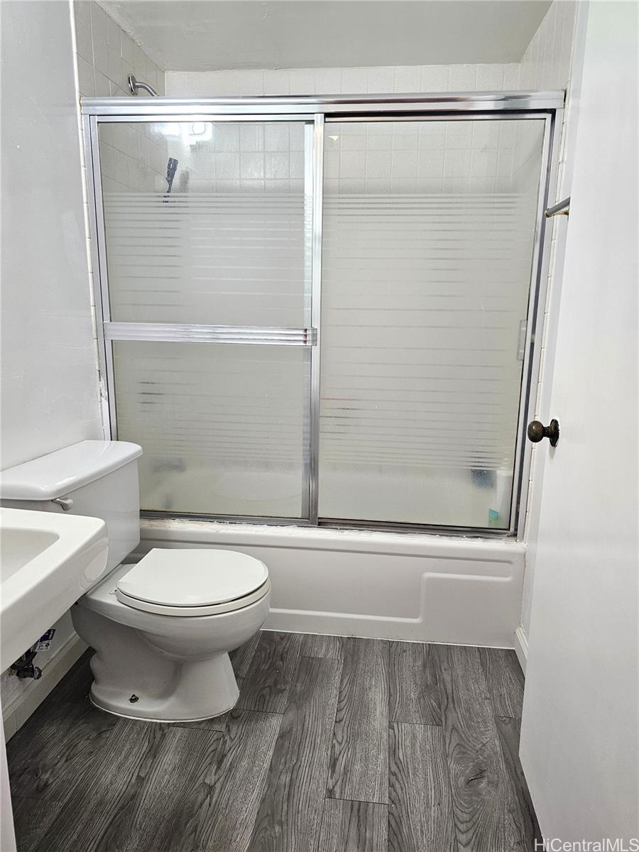1260 Richard Lane, Unit B404 Honolulu, HI 96819 - Photo 13 of 13 a bathroom with a toilet and a shower