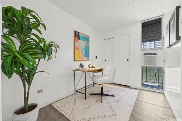 a dining room with table and chairs