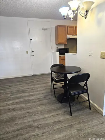 a view of kitchen with breakfast area