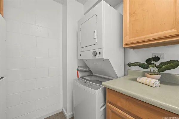 a bathroom with a toilet sink and shower