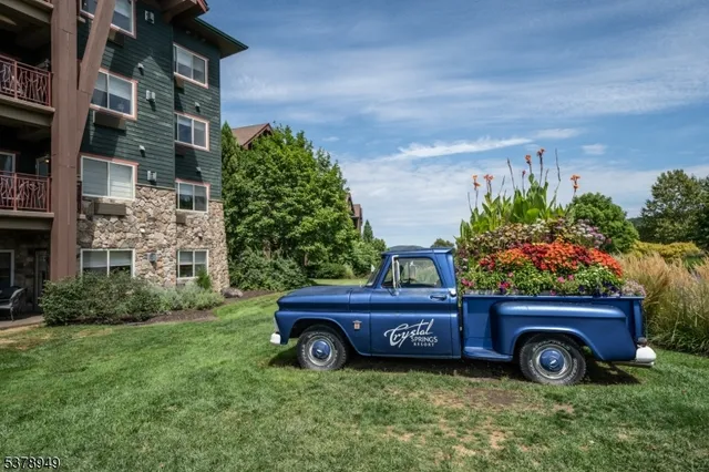 a view of a car in front of building