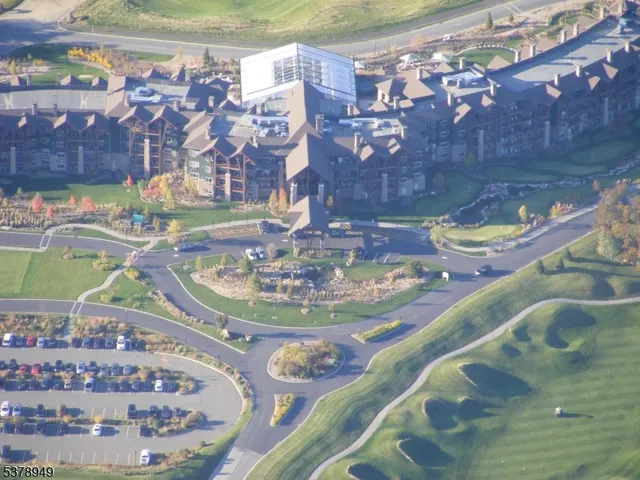 a view of a swimming pool with a yard