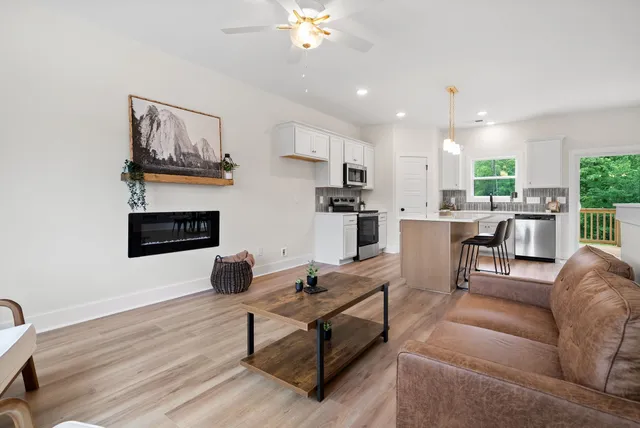 a view of room with wooden floor