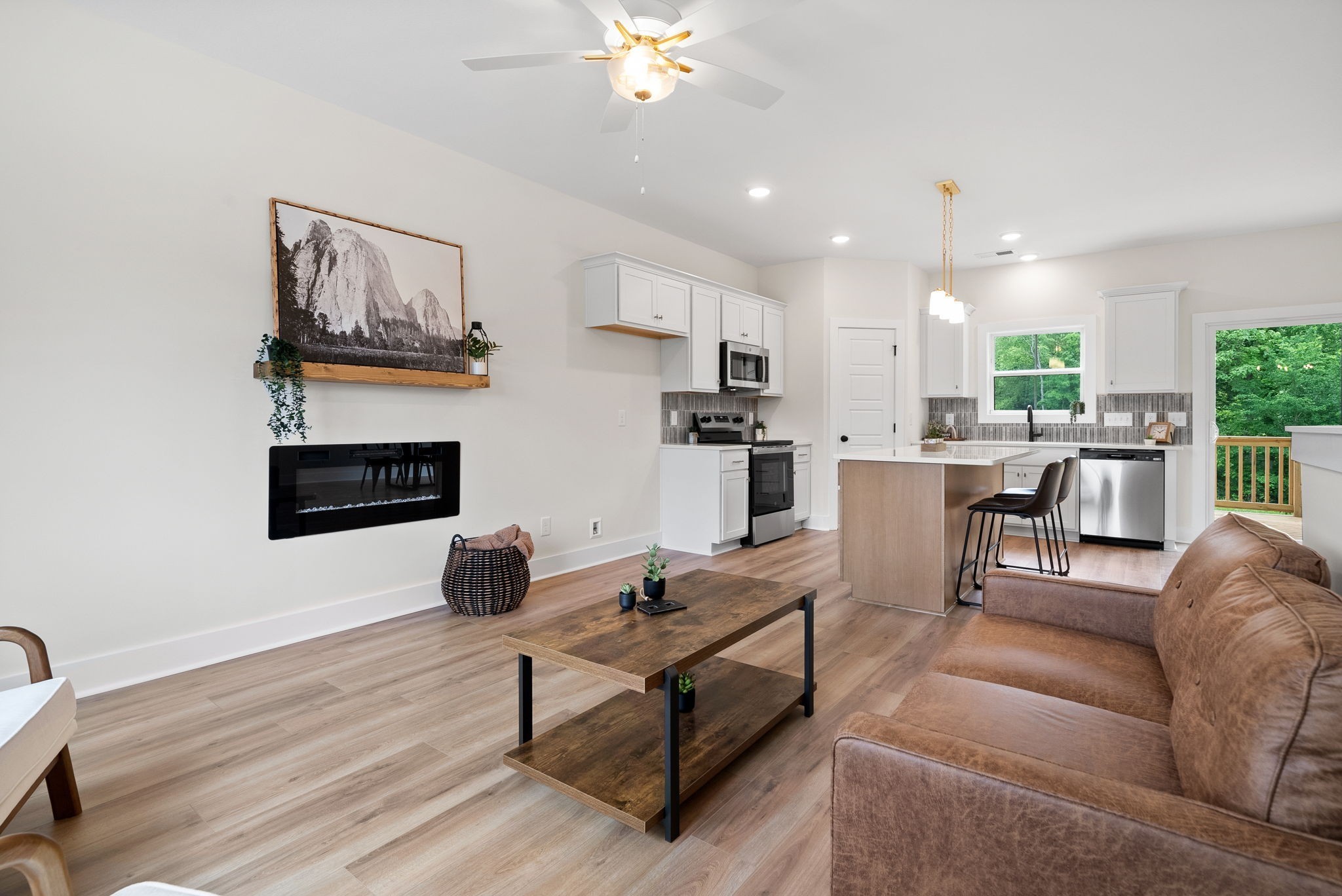 197 Dewberry Road Clarksville, TN 37042 - Photo 12 of 59 a living room with furniture and kitchen view