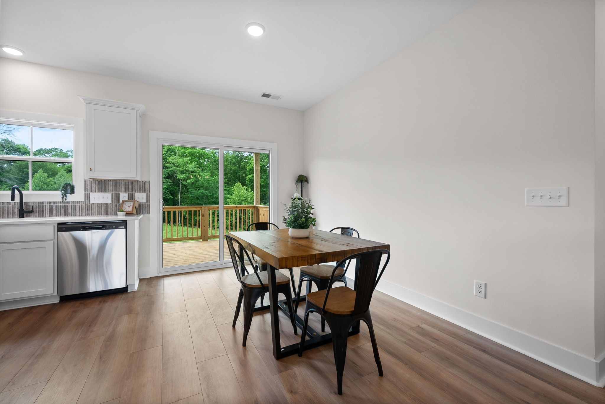 197 Dewberry Road Clarksville, TN 37042 - Photo 20 of 59 a view of a dining room with furniture and wooden floor
