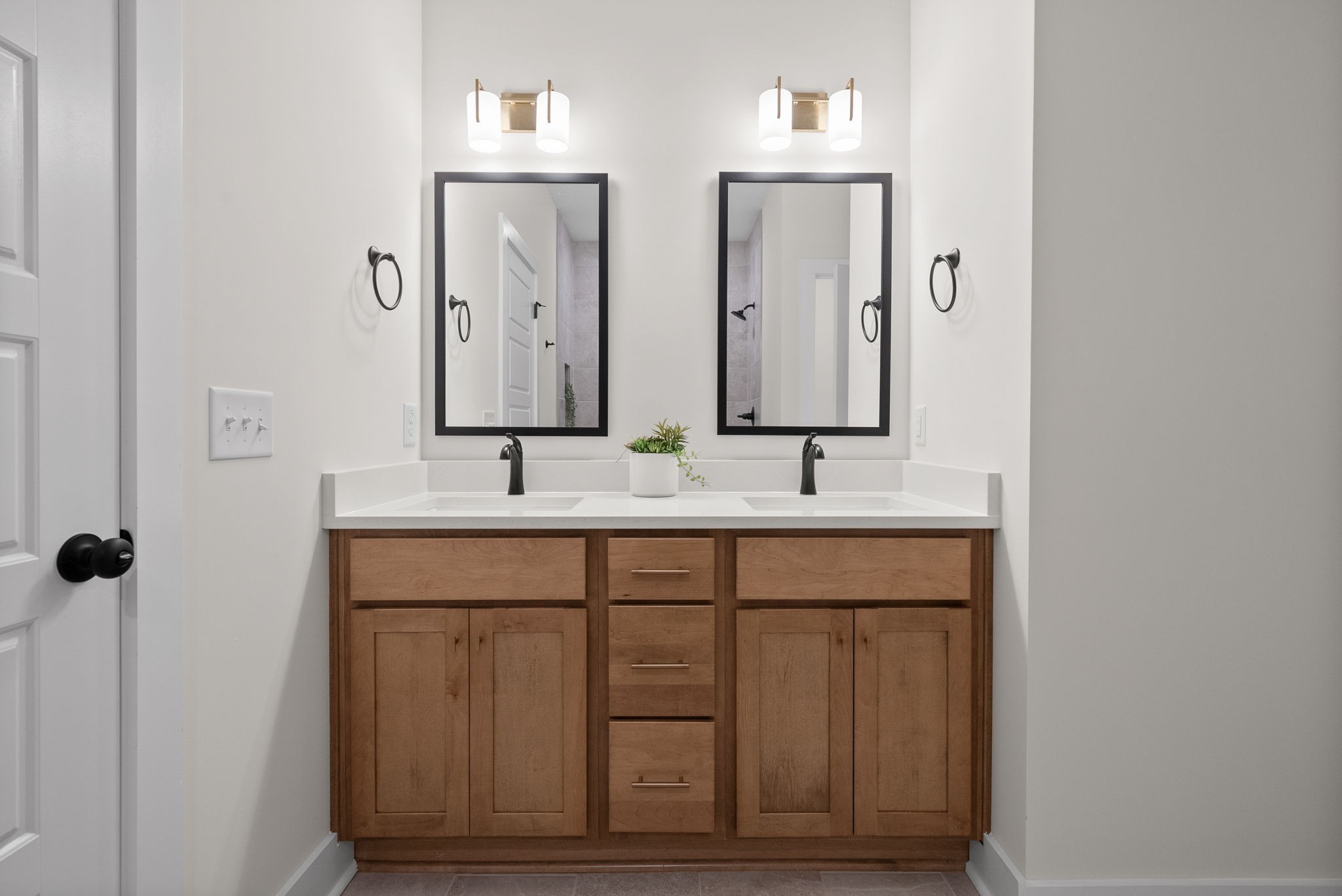 197 Dewberry Road Clarksville, TN 37042 - Photo 35 of 59 a bathroom with a double vanity sink and a mirror
