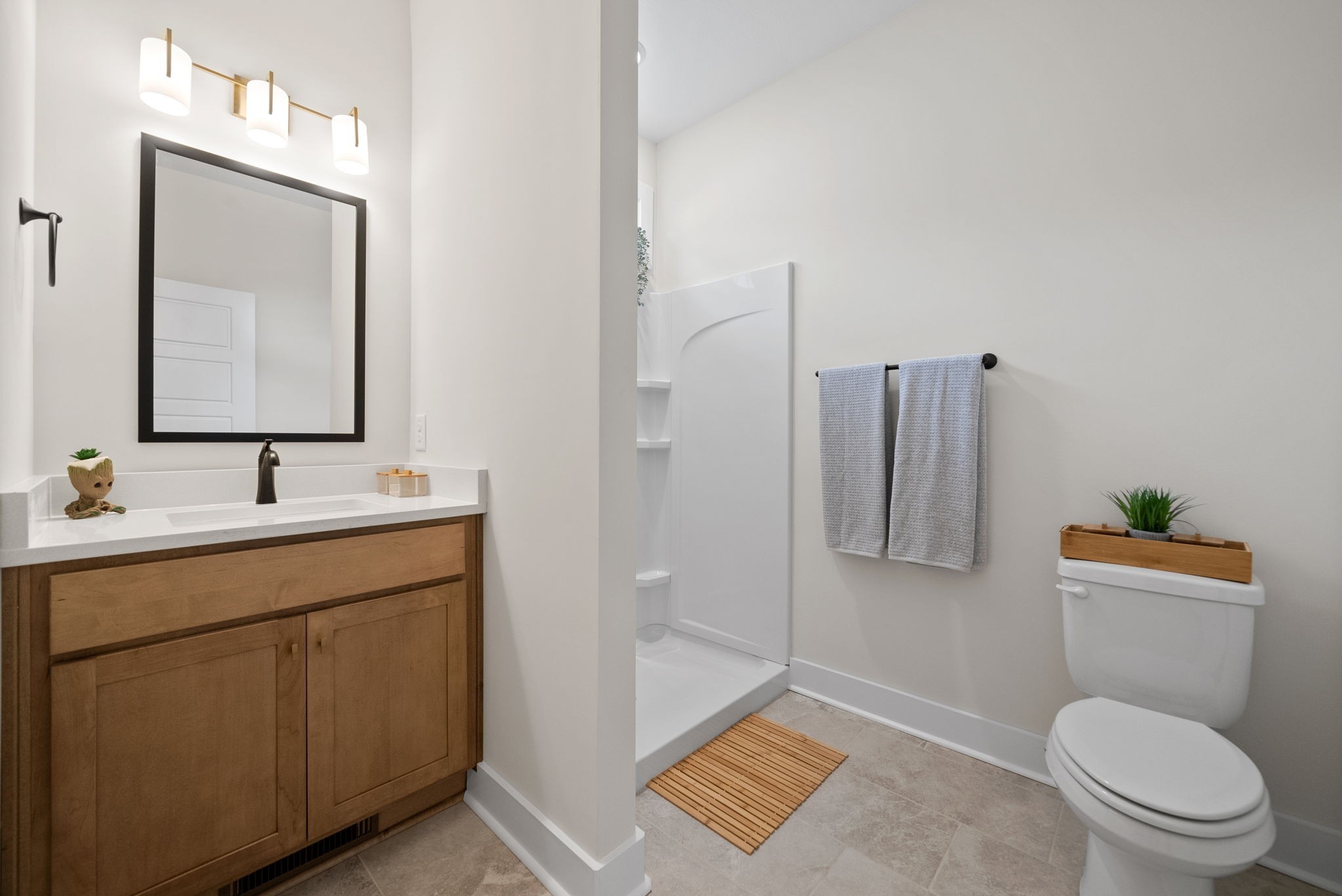 197 Dewberry Road Clarksville, TN 37042 - Photo 46 of 59 a bathroom with a toilet sink and mirror