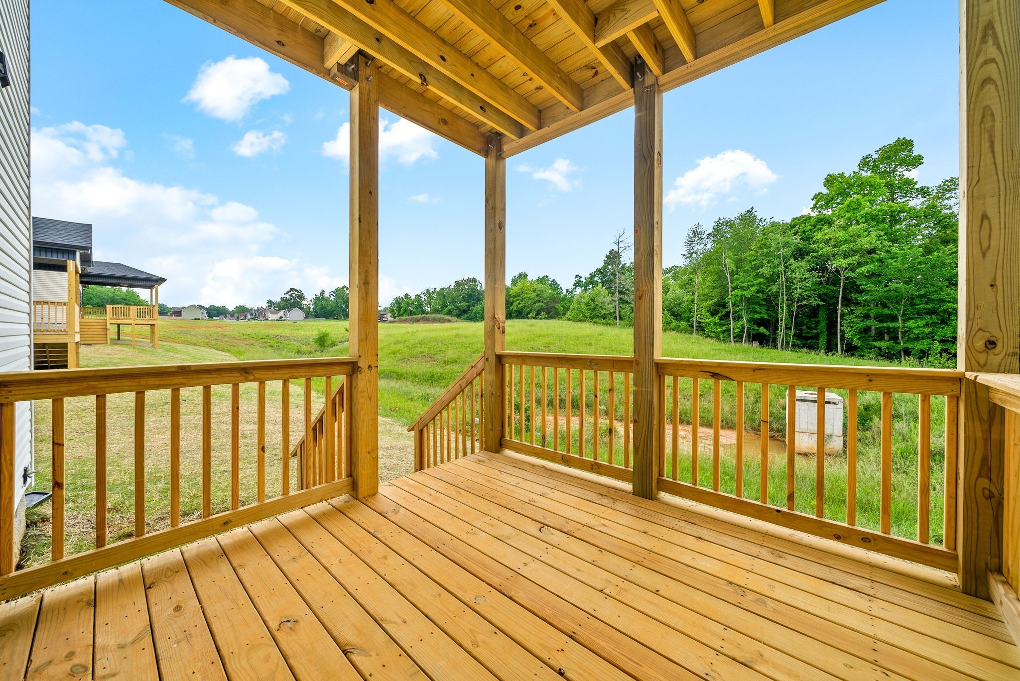 197 Dewberry Road Clarksville, TN 37042 - Photo 48 of 59 a view of a balcony with wooden floor