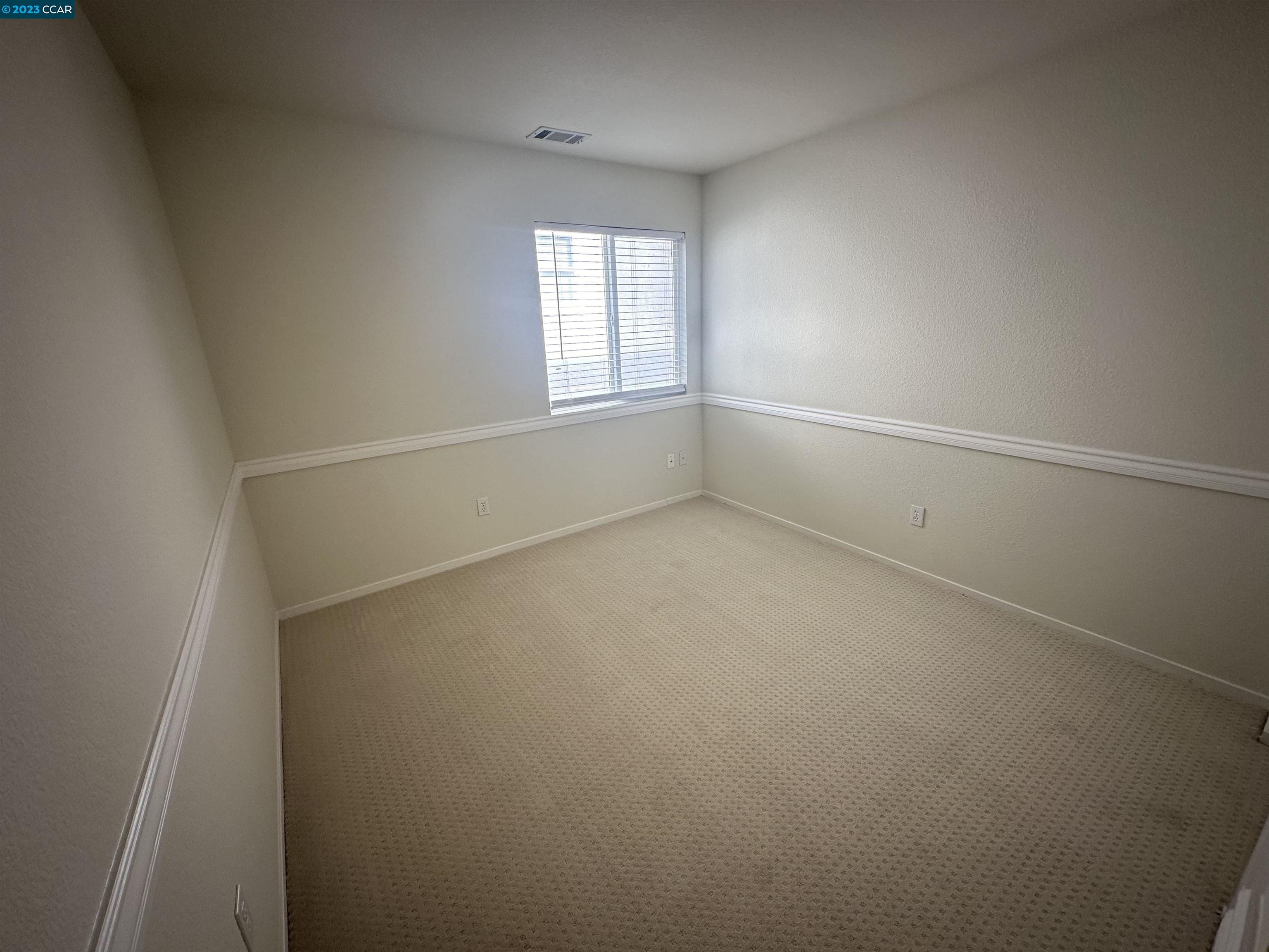4653 Myrtle Drive Dublin, CA 94568 - Photo 19 of 25 a view of an empty room with a window