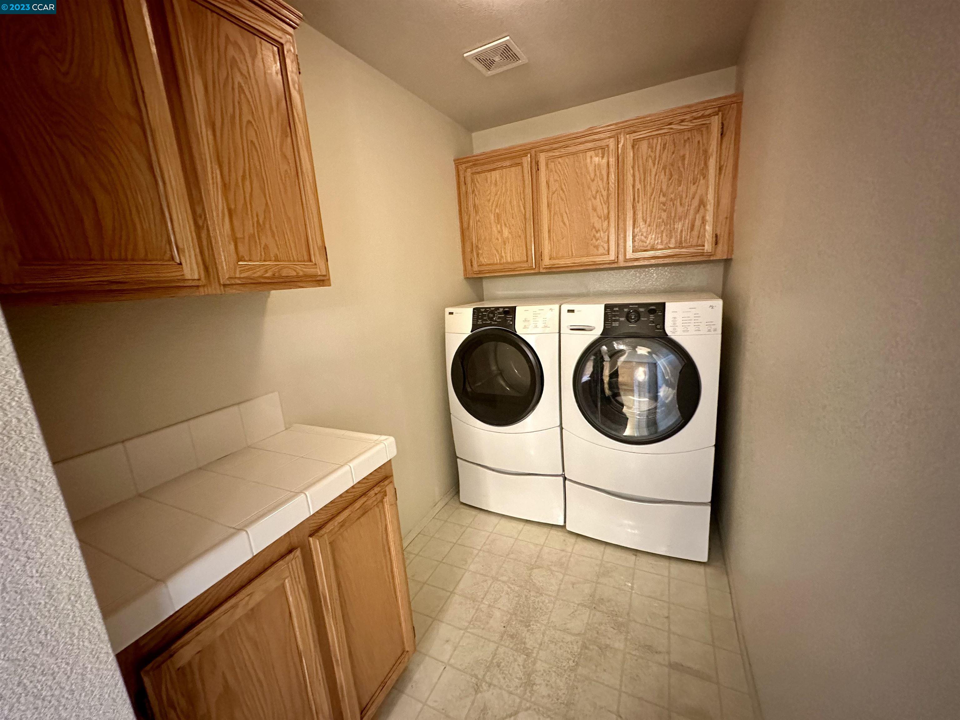 4653 Myrtle Drive Dublin, CA 94568 - Photo 25 of 25 a utility room with dryer and washer