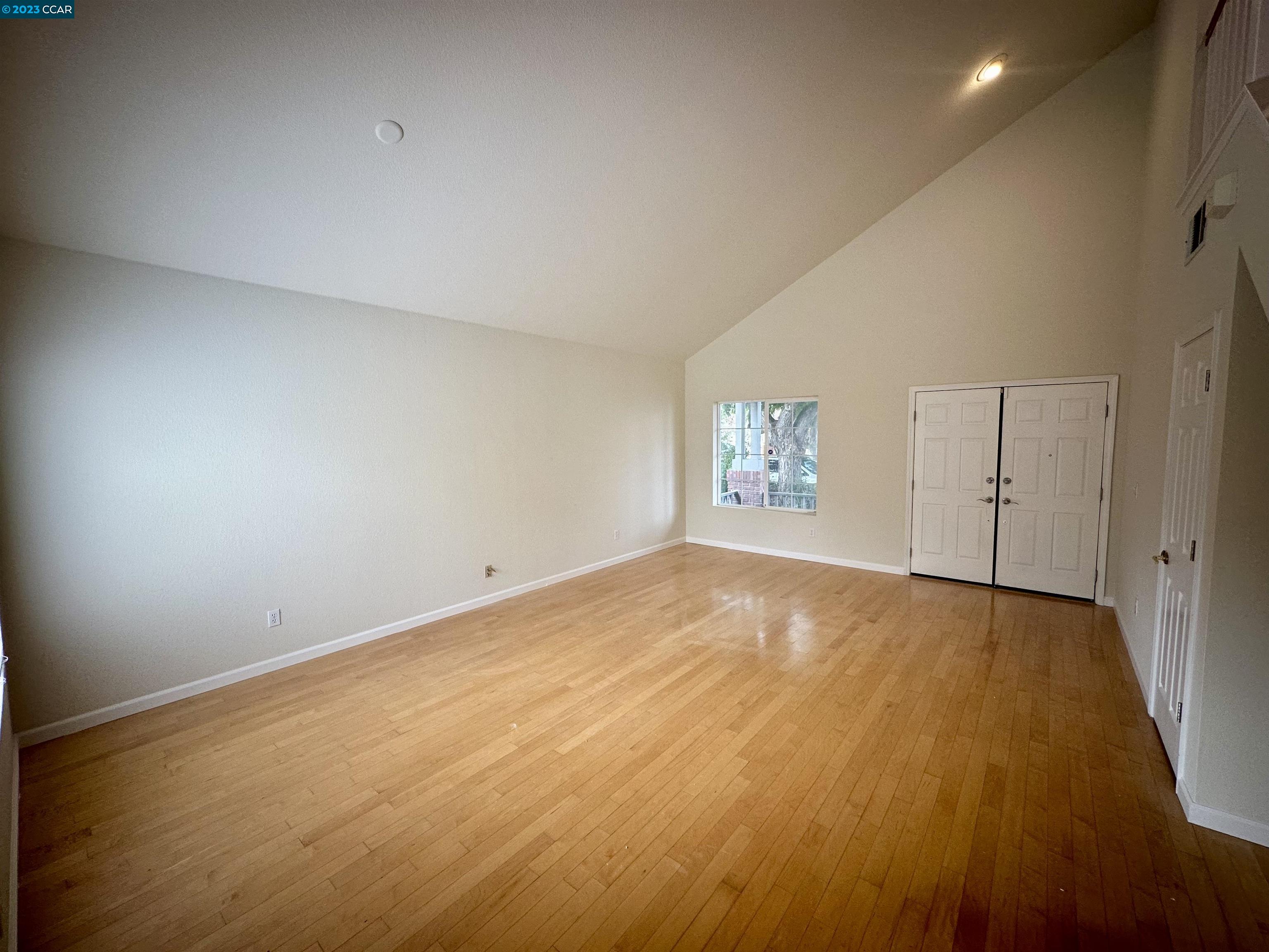 4653 Myrtle Drive Dublin, CA 94568 - Photo 6 of 25 an empty room with a empty space and windows