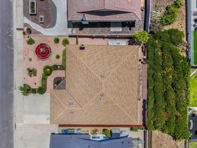 an aerial view of residential building and street